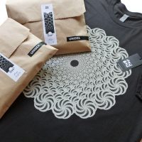 white vortex packaging black tshirt